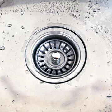 A kitchen sink with drops Stock Photos