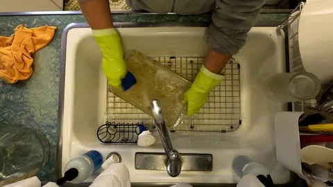 Kitchen Sink Washing Dishes Silverware Pots and Pans Stock Footage 321027481