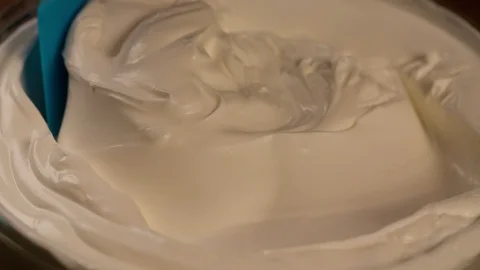 Kitchen Spatula mixing Cream Close up Macro shot Stock Footage 102621540