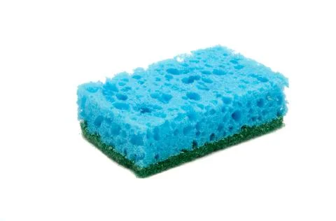 Kitchen sponge for dish isolated on the white Stock Photos