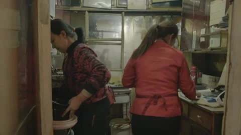 Kitchen Staff Working and Preparing Food in Traditional Beijing Restaurant Stock Footage 345772034