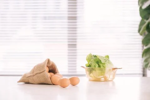Kitchen Still Life.Fresh eggs in a Sack bag. Stock Photos