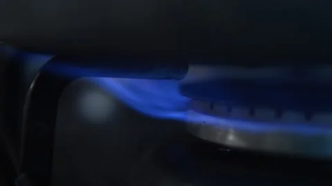 Kitchen stove with methane gas fire. hot flame on the stove burner. Video stock 240694449