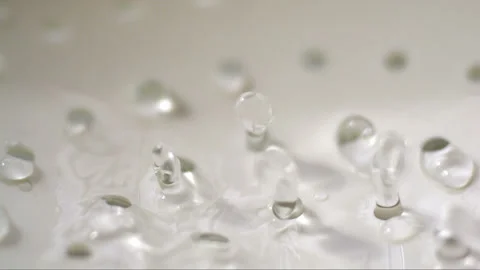 Kitchen strainer in water in slow motion Stock Footage 256951756