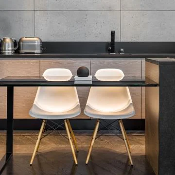 Kitchen table and two chairs Stock Photos