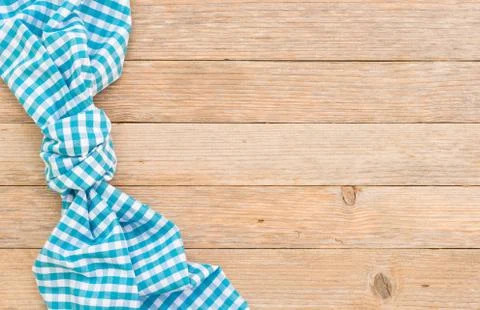 Kitchen table background with rustic blue napkin Stock Photos