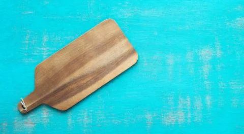 Kitchen table on a blue background. Copy space. Stock Photos