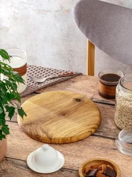 Kitchen table with different attributes and wooden board Foto stock