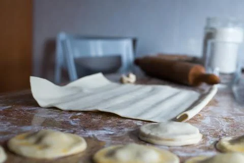 Kitchen table during dumplings preparation Stock Photos