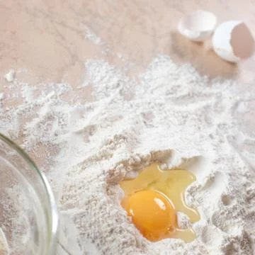Kitchen table with ingredients for cooking baking. Copy space. Cooking concep Stock Photos