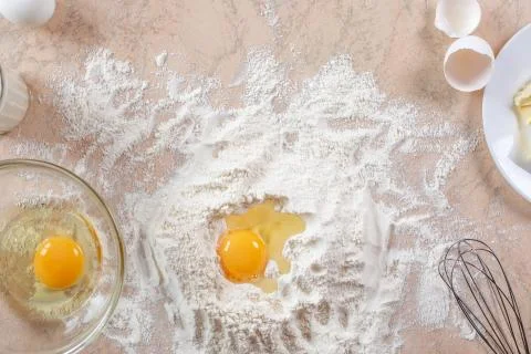 Kitchen table with ingredients for cooking baking. Copy space. Cooking concep Stock Photos