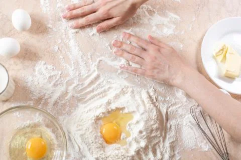 Kitchen table with ingredients for cooking baking. Copy space. Cooking concep Stock Photos