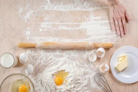 Kitchen table with ingredients for cooking baking. Copy space. Cooking concep Stock Photos