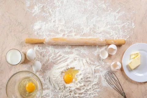 Kitchen table with ingredients for cooking baking. Copy space. Cooking concep Stock Photos