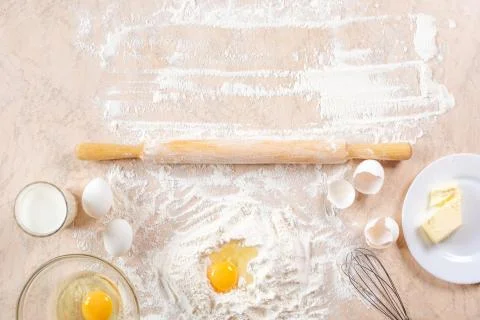 Kitchen table with ingredients for cooking baking. Copy space. Cooking concep Stock Photos
