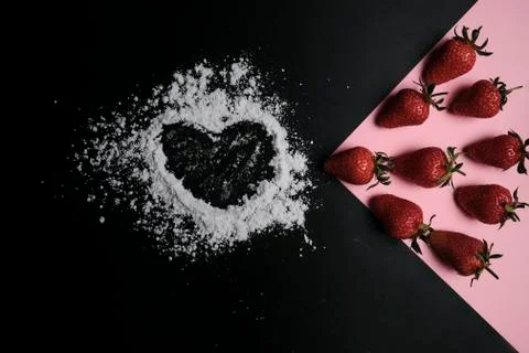 Kitchen table with products, top view. Strawberry and flour. Top view in frame Stock Photos