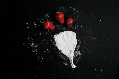 Kitchen table with products, top view. Strawberry and flour. Top view in frame Stock Photos
