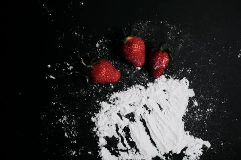 Kitchen table with products, top view. Strawberry and flour. Top view in frame Stock Photos
