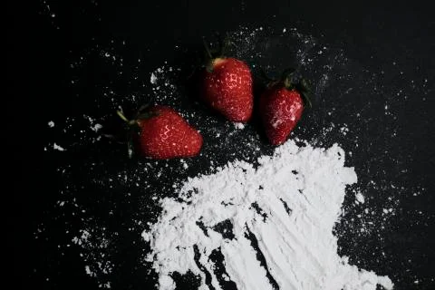 Kitchen table with products, top view. Strawberry and flour. Top view in frame Stock Photos