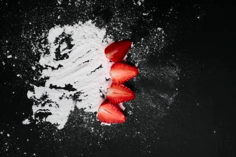 Kitchen table with products, top view. Strawberry and flour. Top view in frame Stock Photos