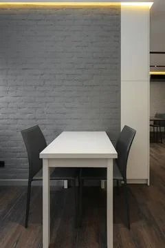Kitchen table with two chairs in the kitchen interior Фото