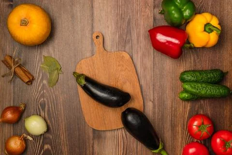 Kitchen table with vegetables for cooking. Top view, flat lay Stock Photos