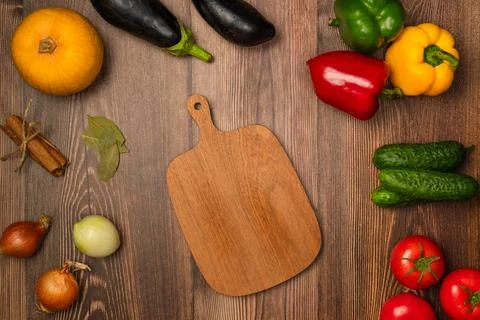 Kitchen table with vegetables for cooking. Top view, flat lay Stock Photos