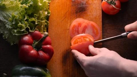 Kitchen table with vegetables. Stock-Fotos