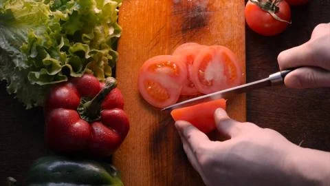 Kitchen table with vegetables. Stock Photos