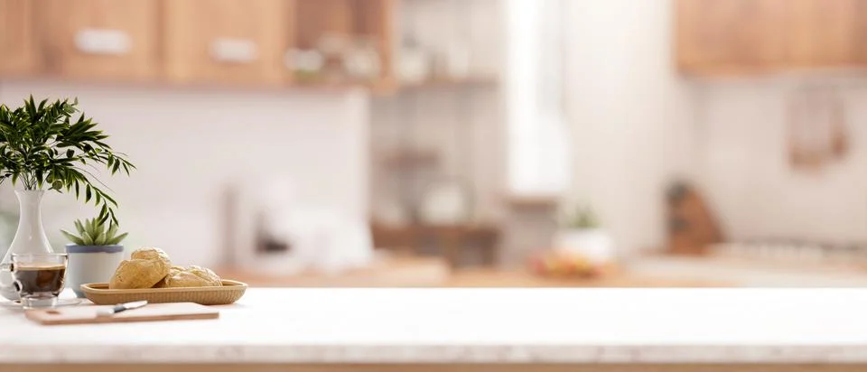 A kitchen tabletop with a blurred background of a minimalist kitchen. Stock Illustration