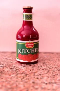 Kitchen timer representing a bottle of tomato juice. Isolated countdown cook  Stock Photos