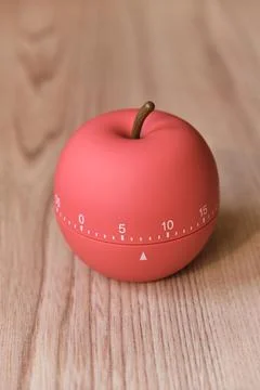 Kitchen timer shaped like a apple on kitchen 写真素材