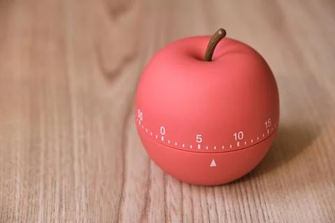 Kitchen timer shaped like a apple on kitchen Stock Photos