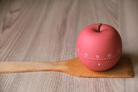 Kitchen timer shaped like a apple on kitchen 스톡 사진