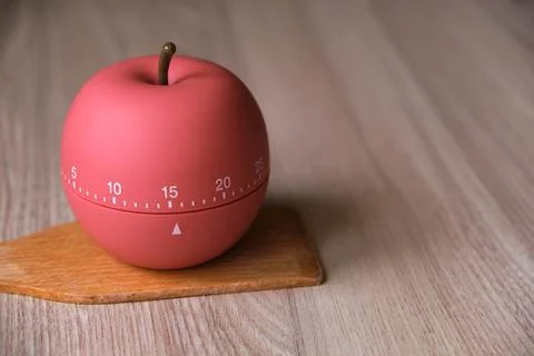 Kitchen timer shaped like a apple on kitchen Stock Photos