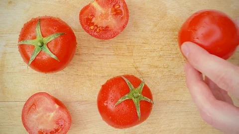Kitchen tomatoes cooking dish cut Stock Footage 128981909