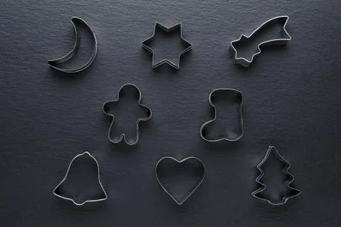 Kitchen tools for gingerbread baking on black background Stock Photos