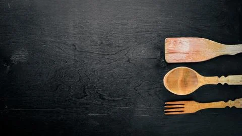 Kitchen tools. On Wooden background. Top view. Stock Photos
