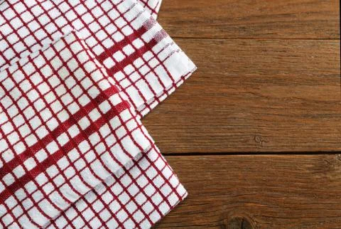 Kitchen towels on rustic table Stock Photos