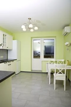 Kitchen in an urban apartment Stock Photos