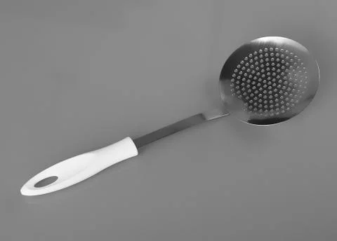 Kitchen utensil colander Stock Photos