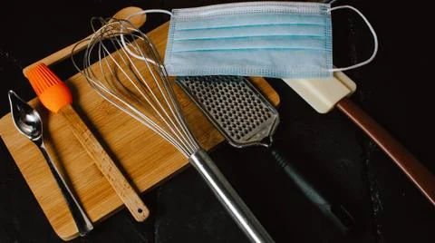 Kitchen utensils and tools. Face mask in modern kitchen. Stock Photos