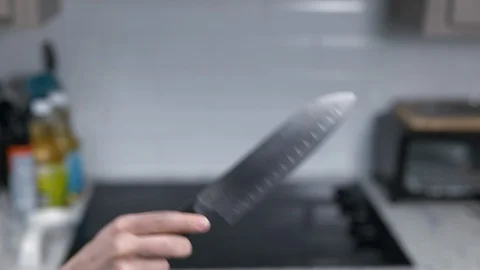 Kitchen Utensils with Stovetop as backdrop Stock Footage 120660824
