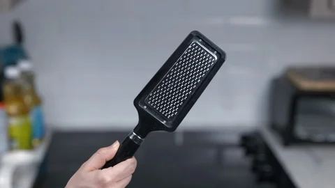 Kitchen Utensils with Stovetop as backdrop Stock Footage 120661236