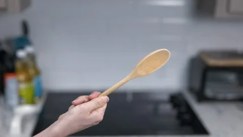 Kitchen Utensils with Stovetop as backdrop Stock Footage 120661377