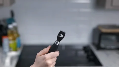 Kitchen Utensils with Stovetop as backdrop Stock Footage 120661498