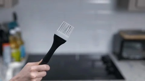 Kitchen Utensils with Stovetop as backdrop Stock Footage 120661516