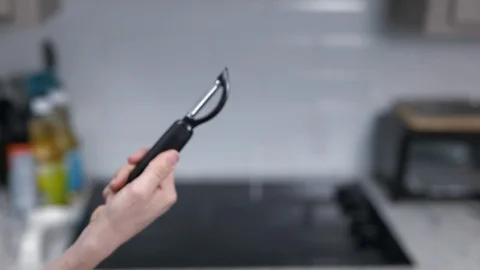 Kitchen Utensils with Stovetop as backdrop Stock Footage 120661798