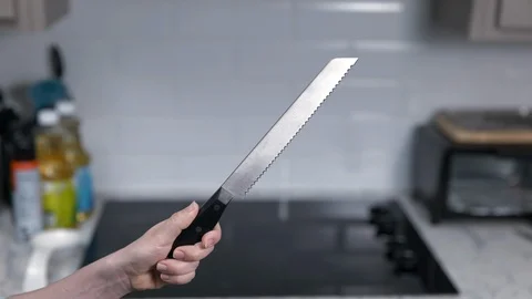 Kitchen Utensils with Stovetop as backdrop Stock Footage 120661922