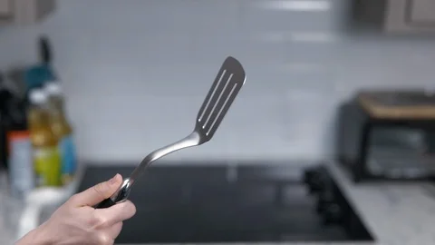 Kitchen Utensils with Stovetop as backdrop Stock Footage 120662287